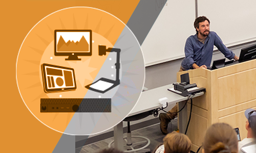 Classroom tools including laptop, monitor, and projector, teacher lecturing to a classroom of students.