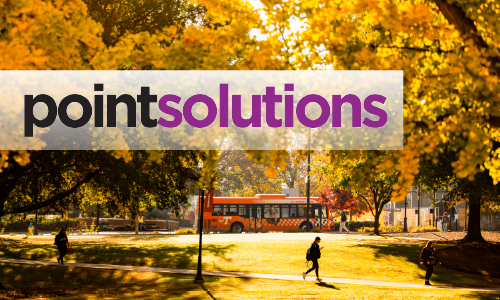 UTK campus in fall with Pointsolutions logo in the foreground. A student is in the mid-ground and a bus in the background